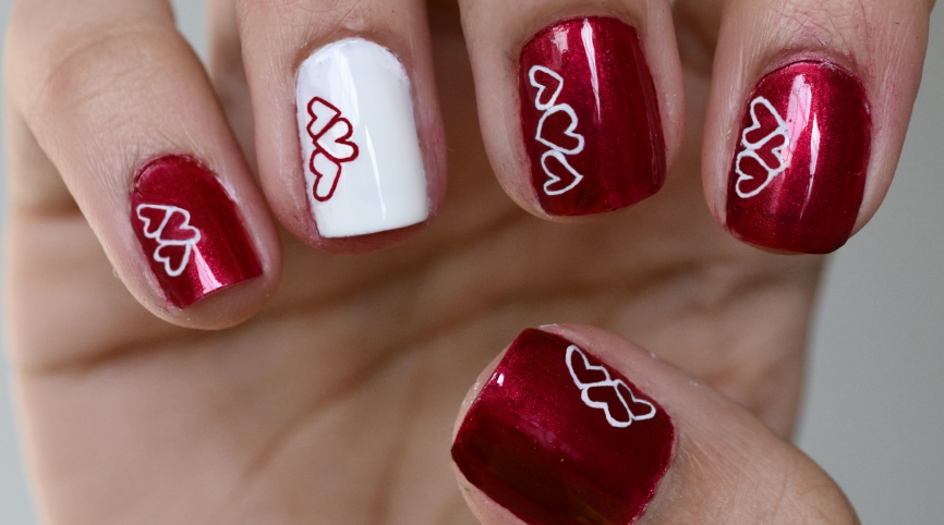 create a heart nail design